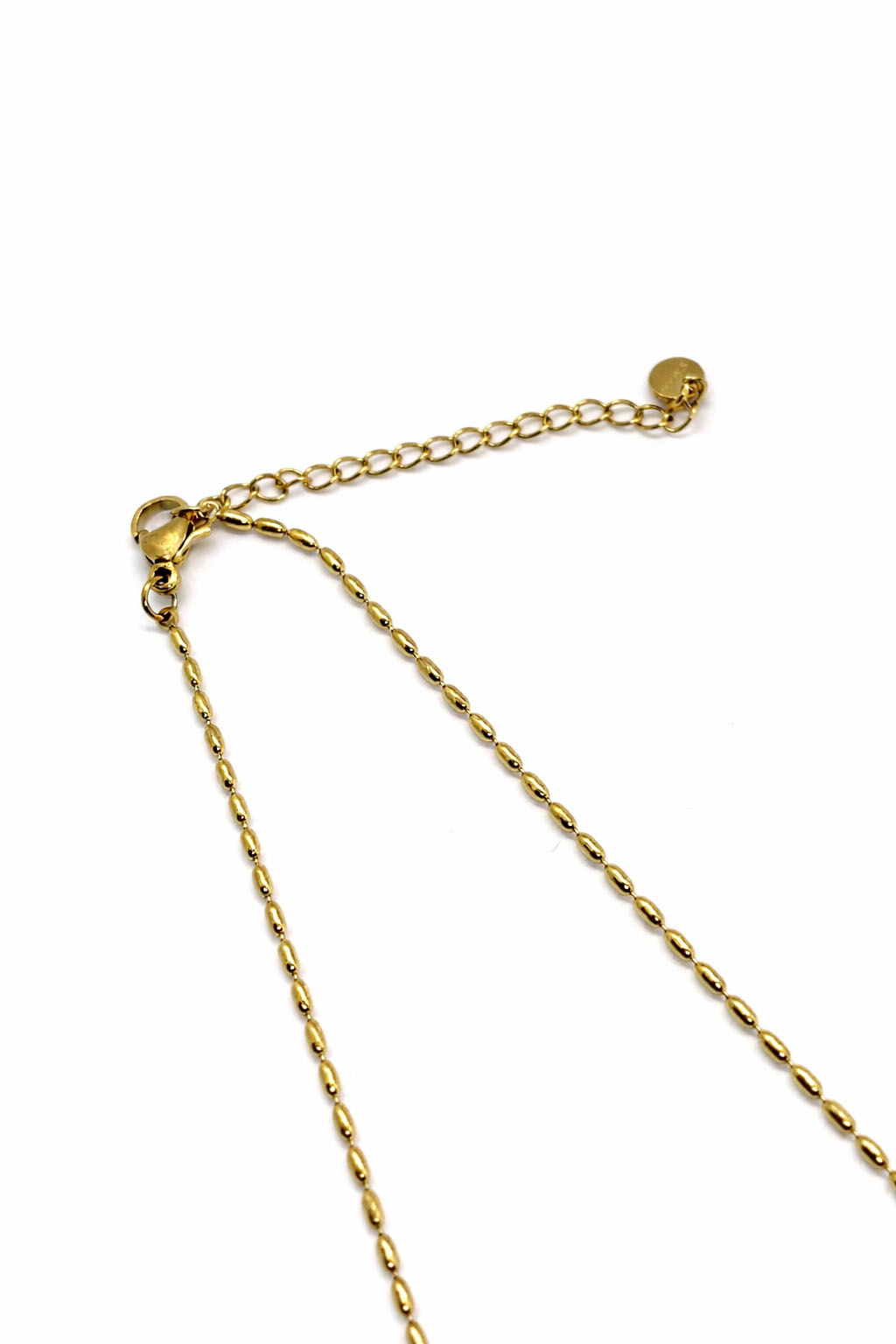 Zirkon Taş Detaylı Sallantılı Altın Renk Çelik Kolye Zirkon Taş Detaylı Sallantılı Altın Renk Çelik Kolye